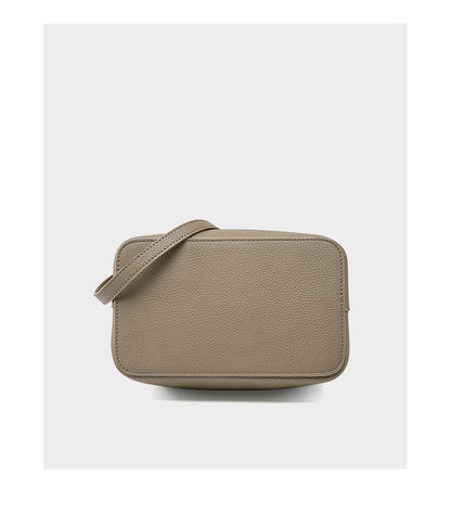 Khaki bucket bag top-down view showing strap and base