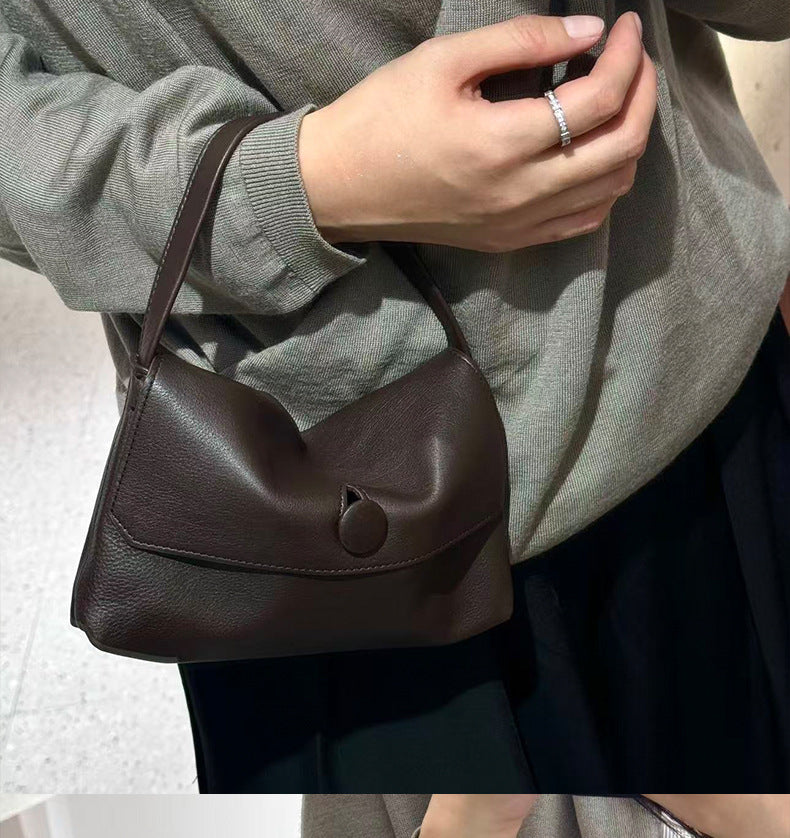 Close view of the coffee bag carried at the shoulder