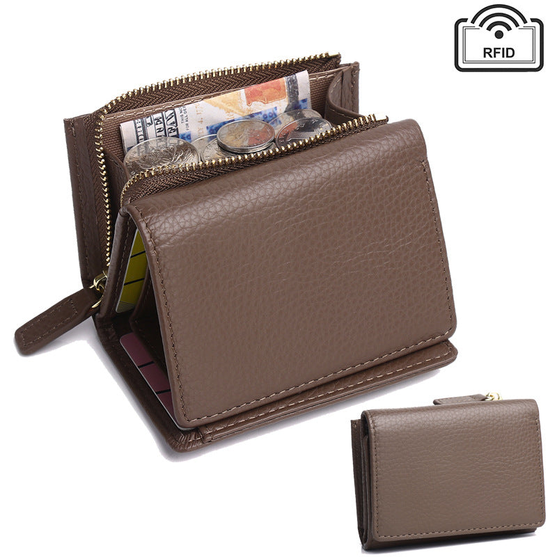 Brown leather wallet with card slots and cash compartment