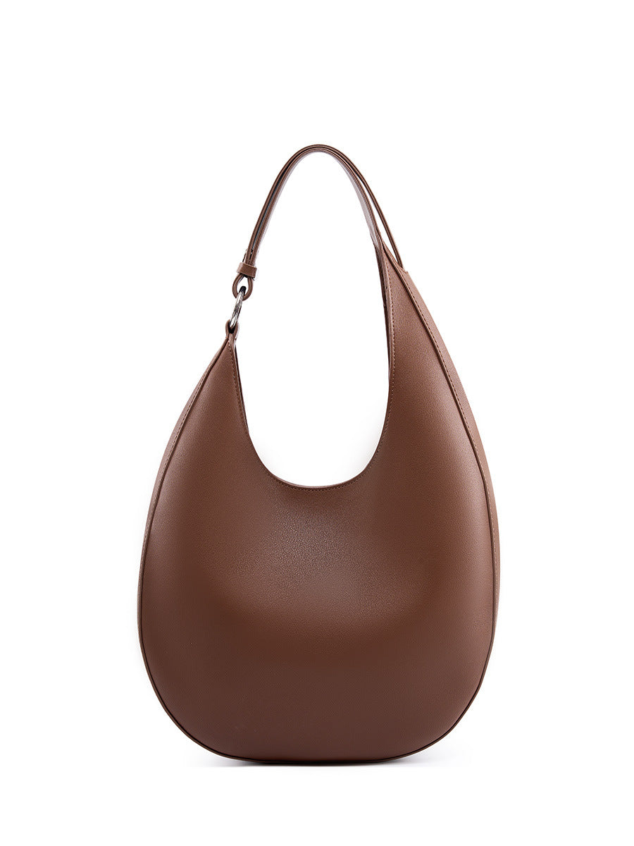 Coffee brown cowhide crescent hobo bag front view on white background