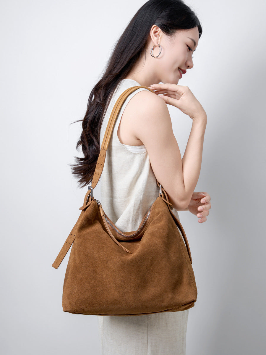 Caramel tote shown on a model from the back
