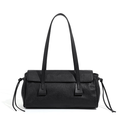 Black cowhide leather shoulder bag with top handles on white background