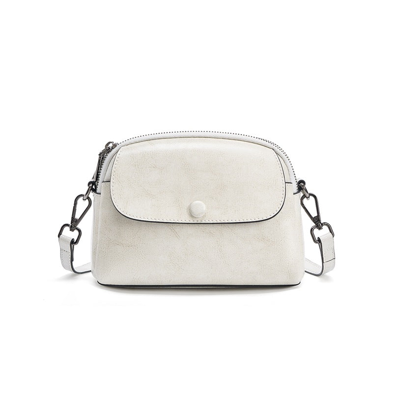 Pearl white oil-waxed leather crossbody bag front view