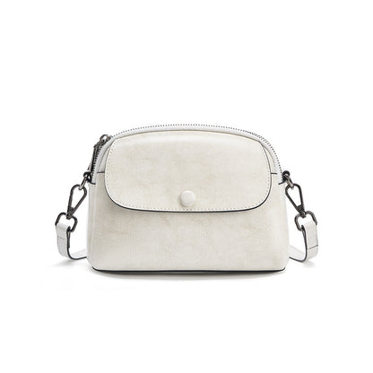 Pearl white oil-waxed leather crossbody bag front view