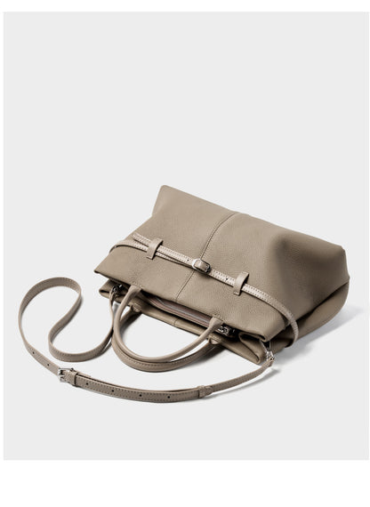 Top-down view of empty elephant gray tote showing front buckle strap and interior