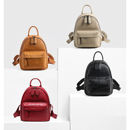 Leather mini backpacks displayed in several colors