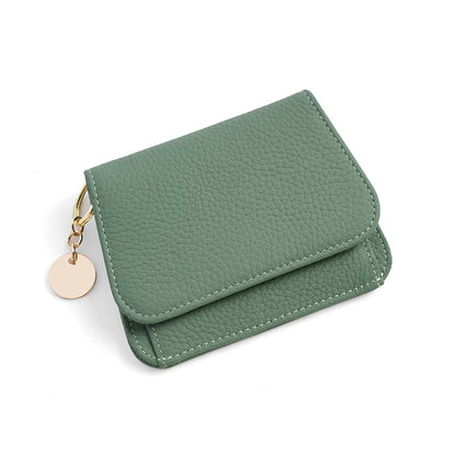 Sage green leather mini wallet with gold round keyring charm