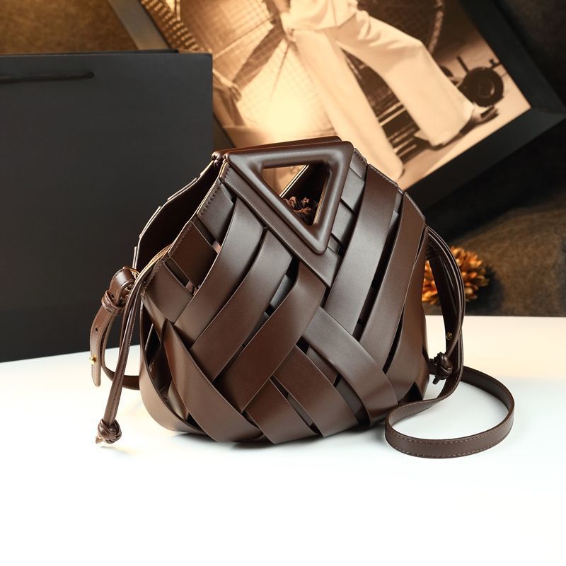 Coffee brown woven bucket bag with drawstring opening