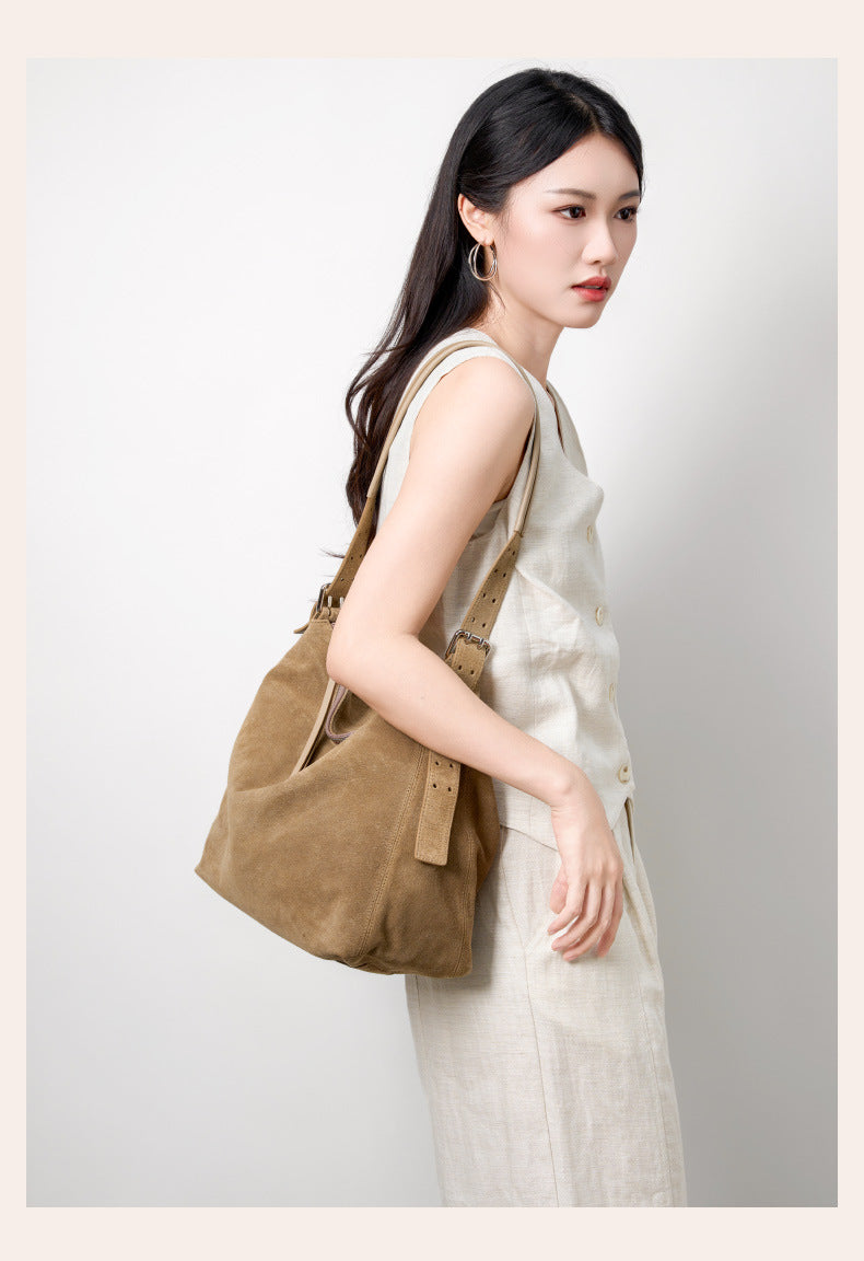 Side view showing the tote worn over the shoulder