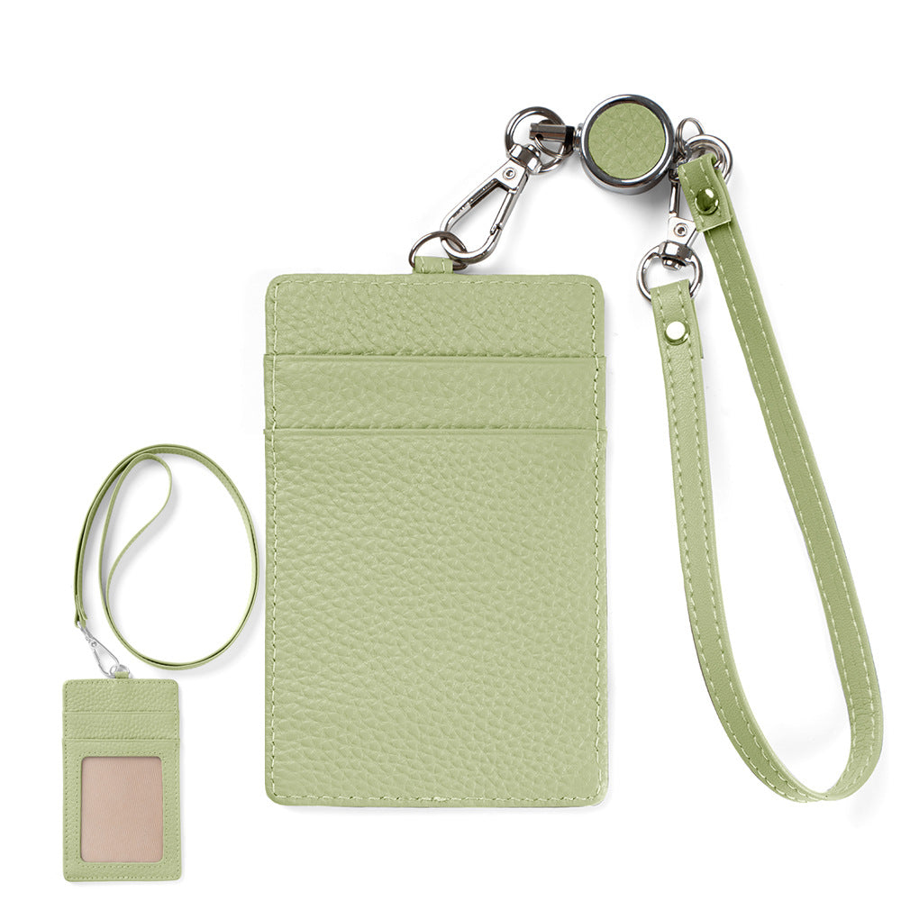 Light green leather pass case with neck strap and wrist strap