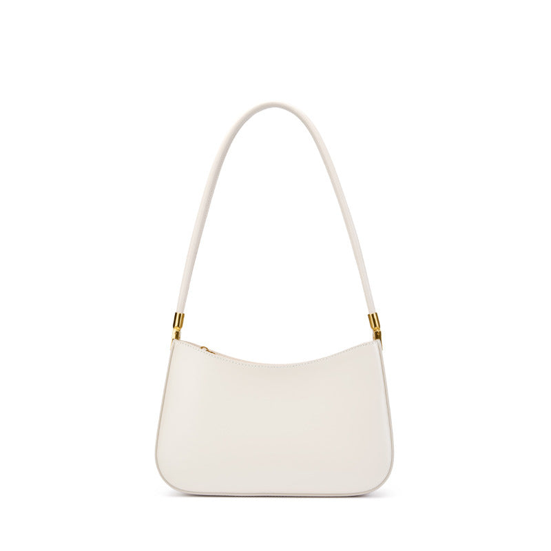 Cream cowhide leather shoulder bag shown from the front on a white background