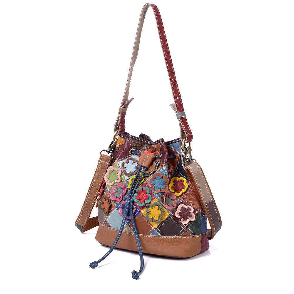 Bucket bag shown carried on the shoulder from two angles