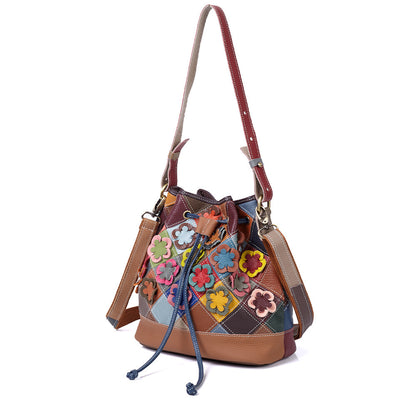 Bucket bag shown carried on the shoulder from two angles