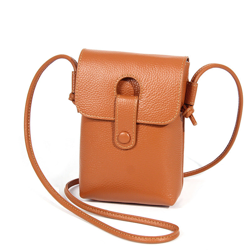 Earthy yellow pebbled cowhide leather phone bag with magnetic snap closure