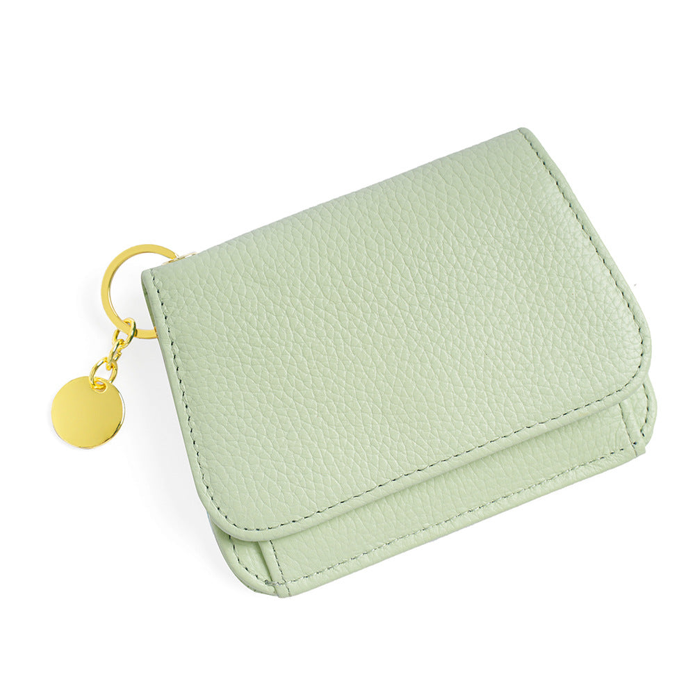 Mint green leather mini wallet with gold keyring charm