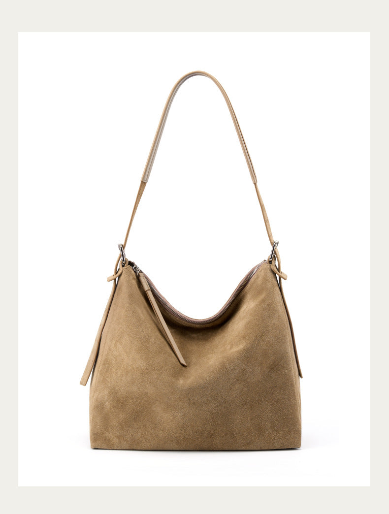 Front view of the khaki suede tote with shoulder strap