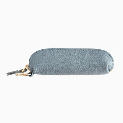 Light blue pebbled cowhide mini zip pouch with gold keyring