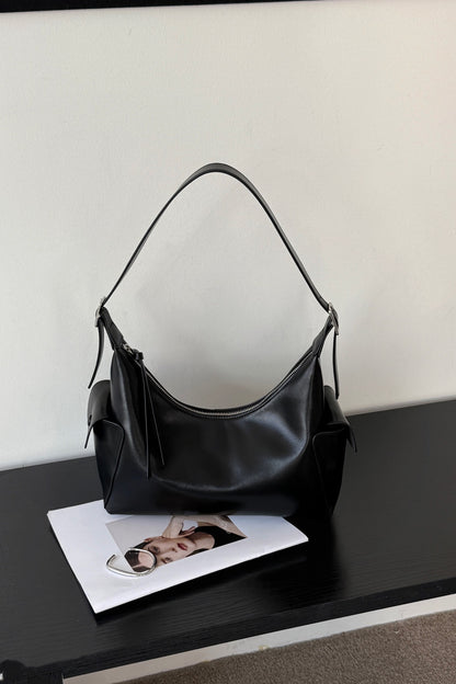 Black cowhide hobo shoulder bag with zip top, front view