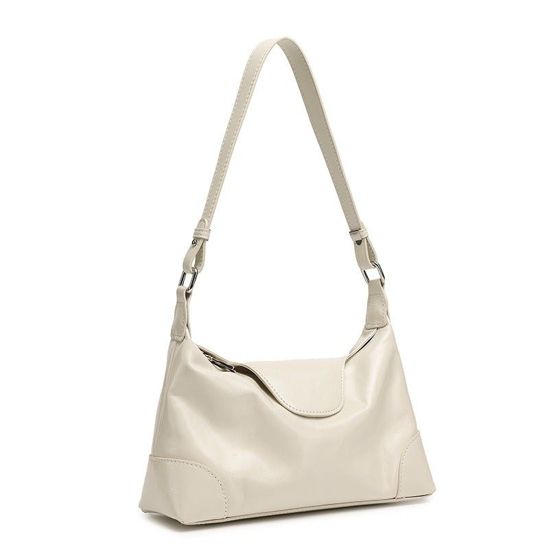 Pearl white cowhide leather shoulder bag with magnetic flap closure