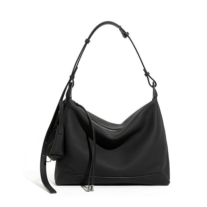 Front view of soft cowhide leather hobo shoulder bag in black on white background