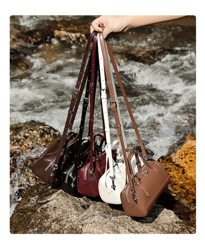 All five color variants of the cowhide leather mini Boston bowling bag held together