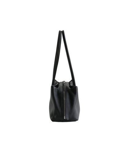 Black tote shown from the side with zipper visible