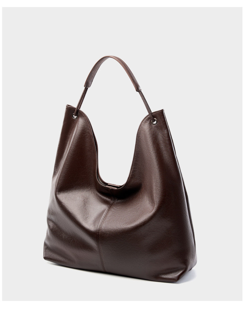 Dark brown hobo tote bag front view on light gray background