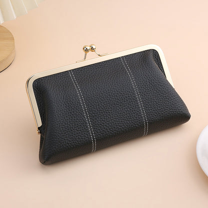 Black pebbled cowhide frame clutch with contrast stitching