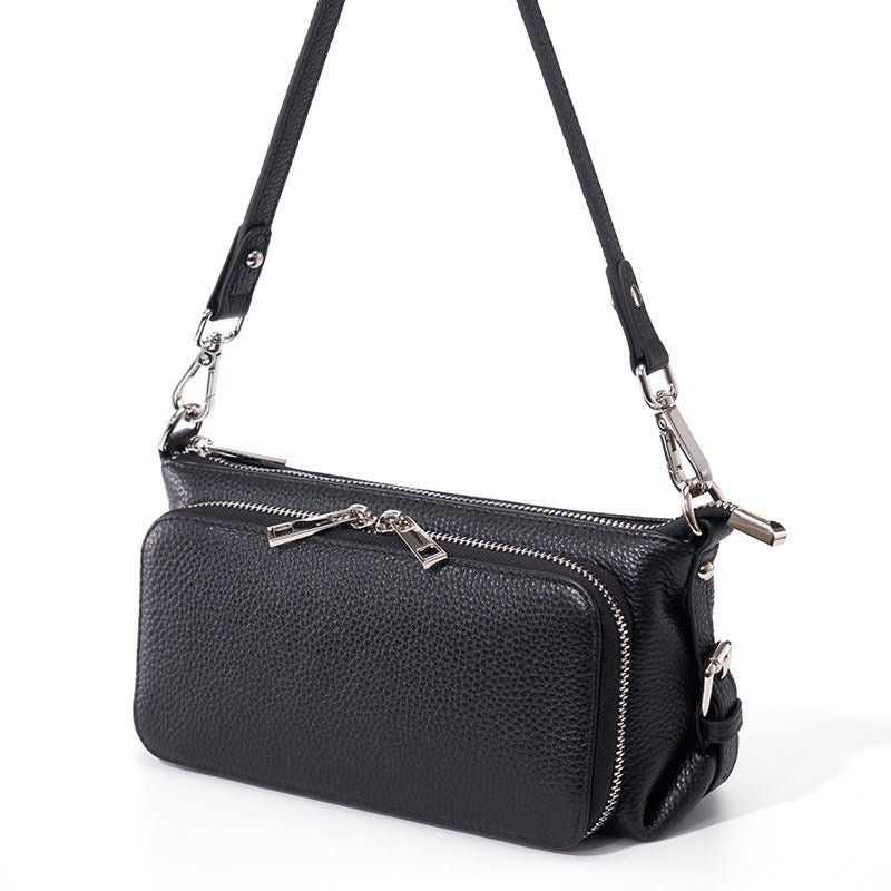 Black leather crossbody bag with adjustable strap