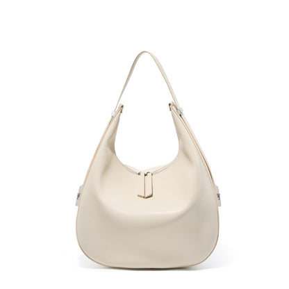 Cream white cowhide leather crescent hobo shoulder bag front view on white background, top zip and adjustable strap visible