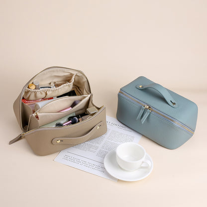 Open cosmetic pouch showing interior sections for organizing toiletries
