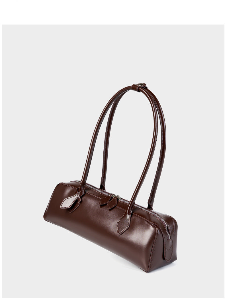 Coffee leather baguette bag three-quarter view with open zip top