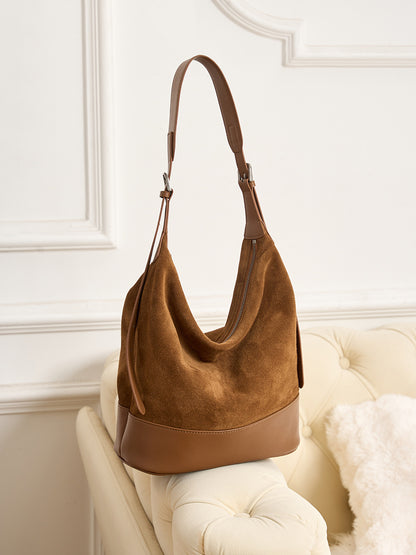 Angled view showing the shoulder strap and zip opening