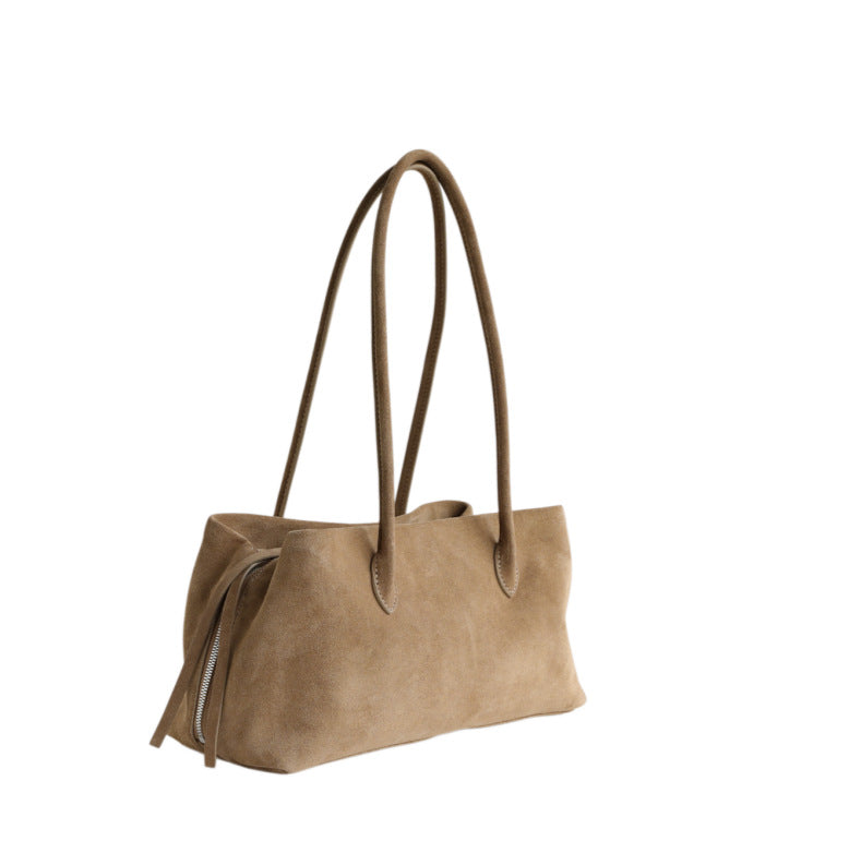 Taupe tote shown from a side angle