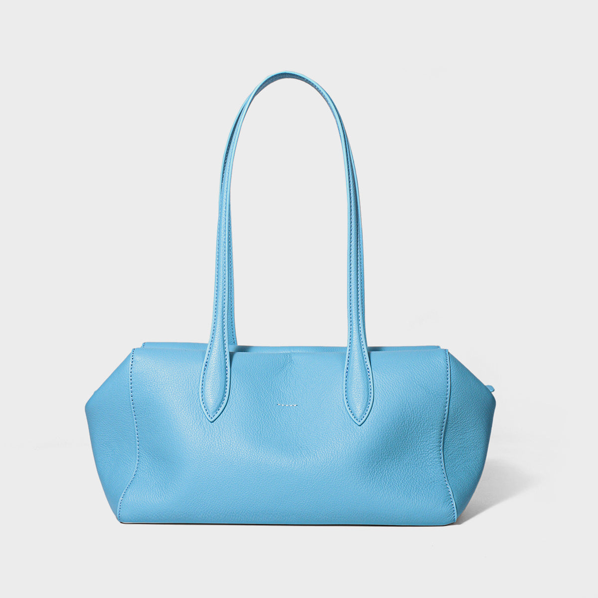 Peacock-blue cowhide tote with twin shoulder straps