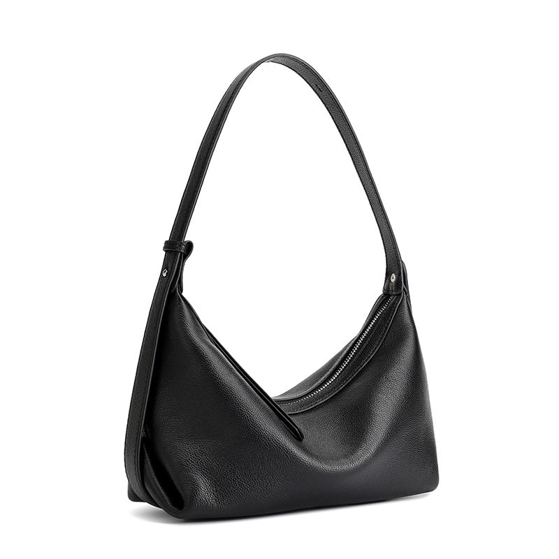 Black leather hobo bag on white background