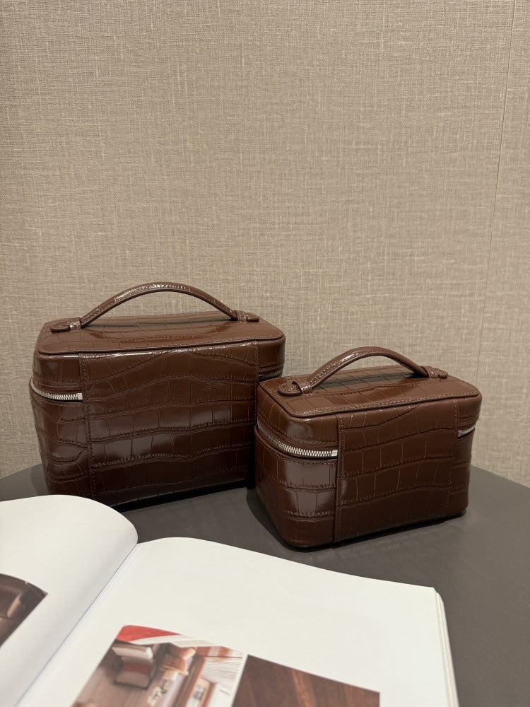 Large and small chocolate pouches viewed from an angle