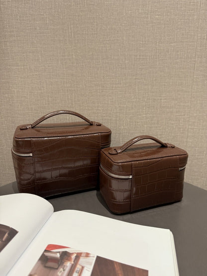 Large and small chocolate pouches viewed from an angle