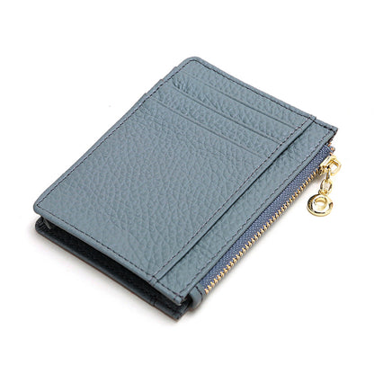 Light gray leather card holder showing exterior card slots
