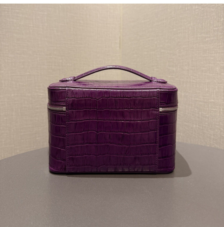 Angled view highlighting the purple pouch's embossed texture