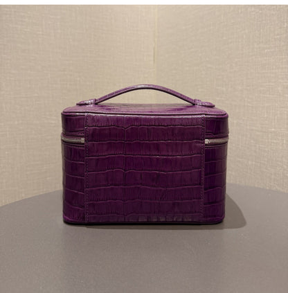 Angled view highlighting the purple pouch's embossed texture