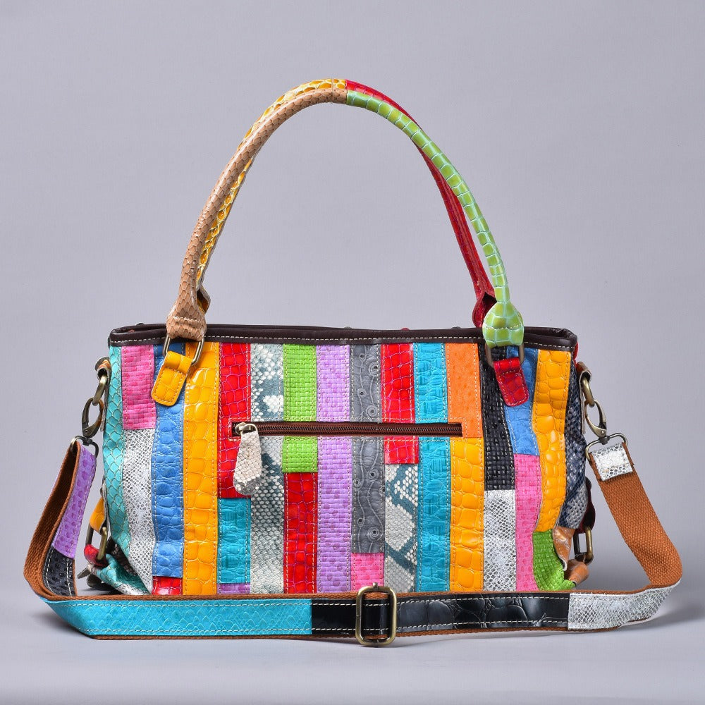 Back view of multicolor patchwork leather bag with exterior zip pocket