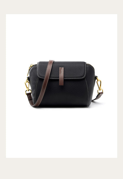 Front studio view of the black shell crossbody bag