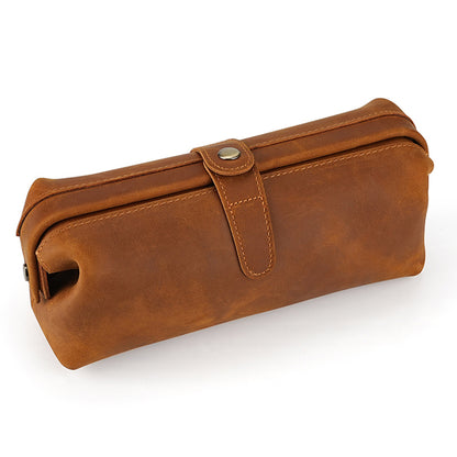 Brown top-grain cowhide cosmetic pouch with snap tab closure