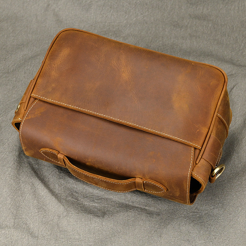 Rear angled view highlighting the smooth leather panel