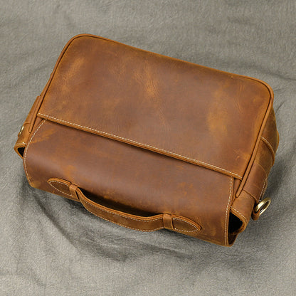 Rear angled view highlighting the smooth leather panel