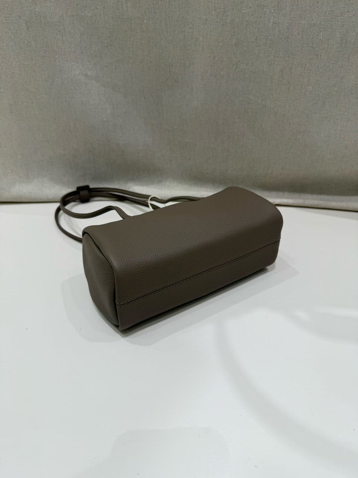 Bottom view of the ebony leather shoulder bag