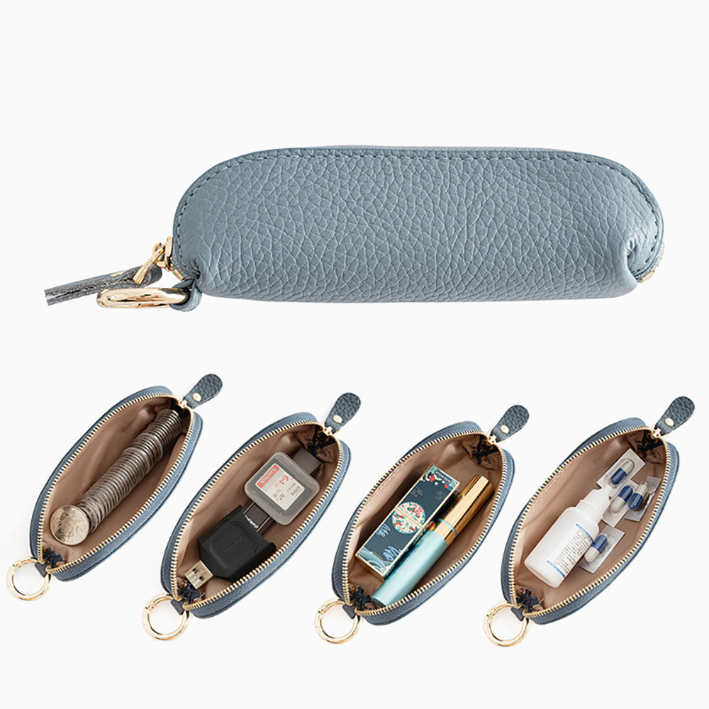 Mini zip pouch interior capacity display showing coins, memory cards, lipstick, and small bottles