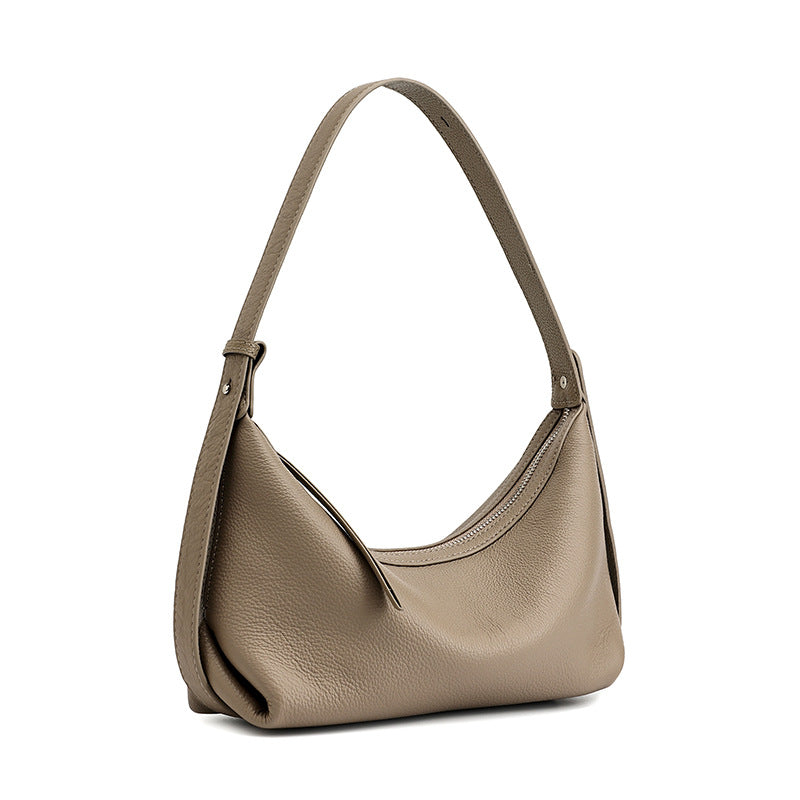 Elephant grey leather hobo bag on white background