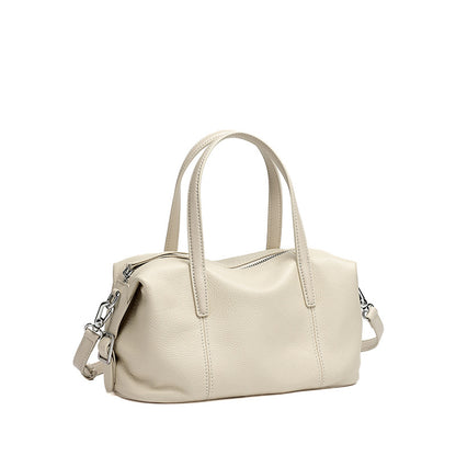 Off-white top-grain cowhide soft pillow bag on white background
